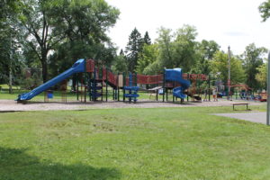 Colorful playground equipment in a park near Big Powderhorn Mountain.