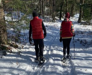 Snowshoers enjoying winter fun near Big Powderhorn Mountain.
