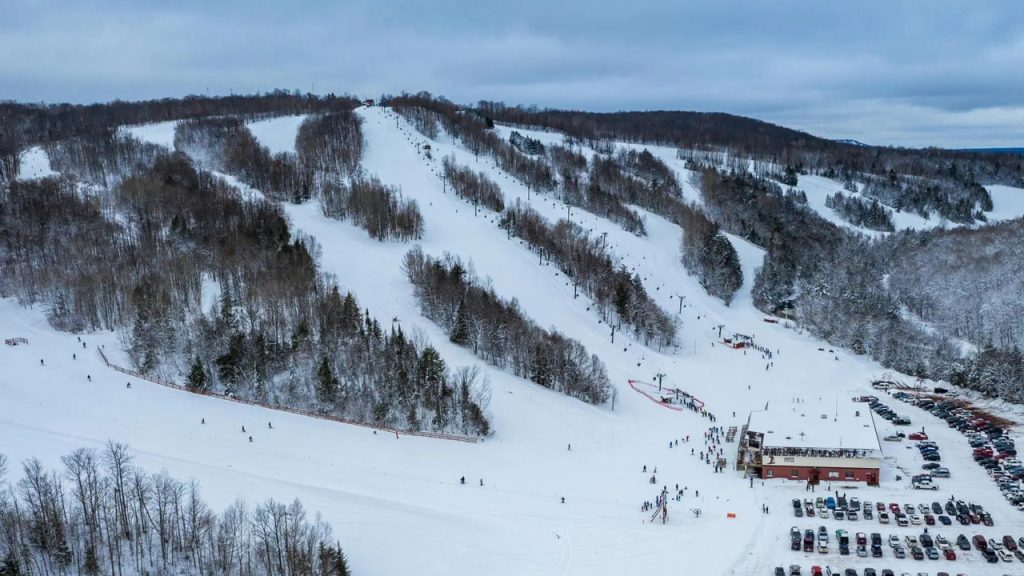 Ski resort near Big Powderhorn Lodging with groomed slopes and ski lifts.