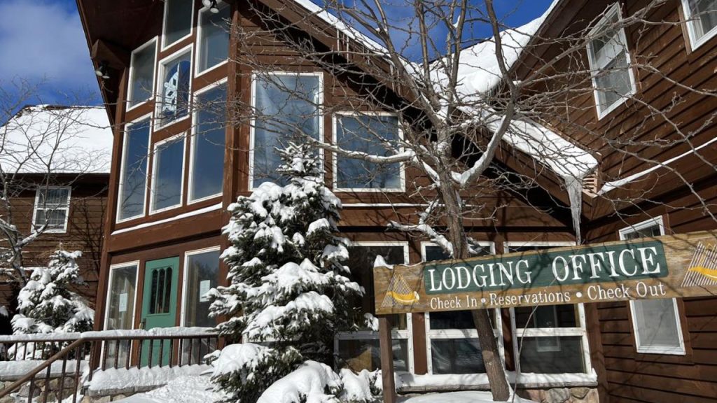 Lodging office sign at ski area near Big Powderhorn Lodging