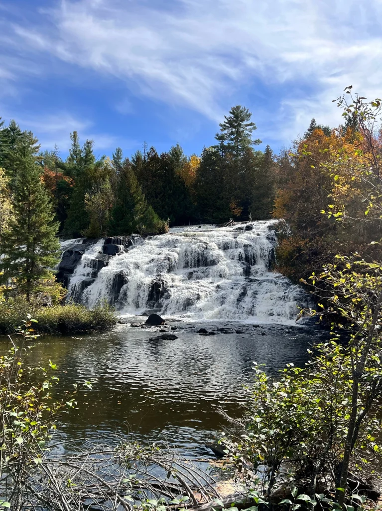 Scenic waterfall and autumn foliage near ATV trails in Upper Peninsula